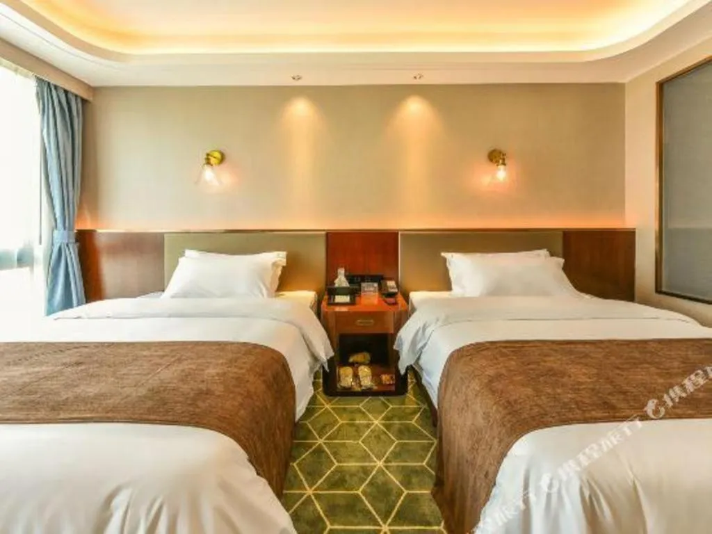 Bed in Guilin Plaza Hotel