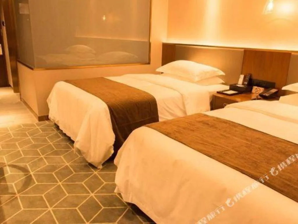 Bed in Guilin Plaza Hotel