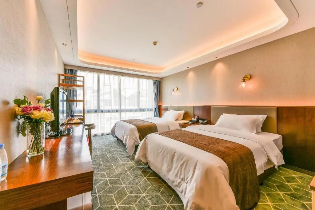 Bed in Guilin Plaza Hotel