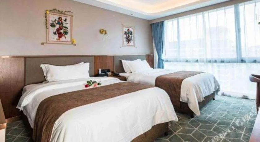 Bed in Guilin Plaza Hotel