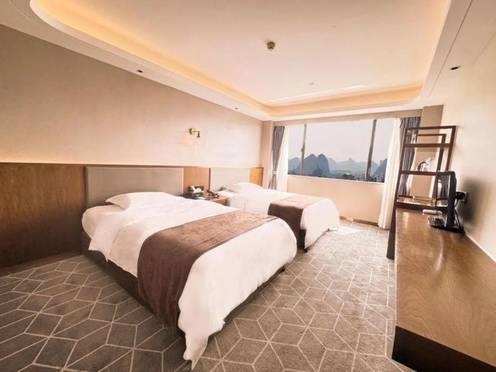 Bed in Guilin Plaza Hotel