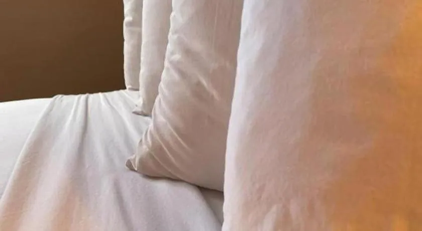 Bed in Americas Best Value Inn Torrington