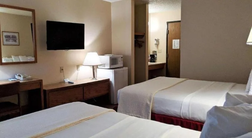 Bed in Americas Best Value Inn Torrington