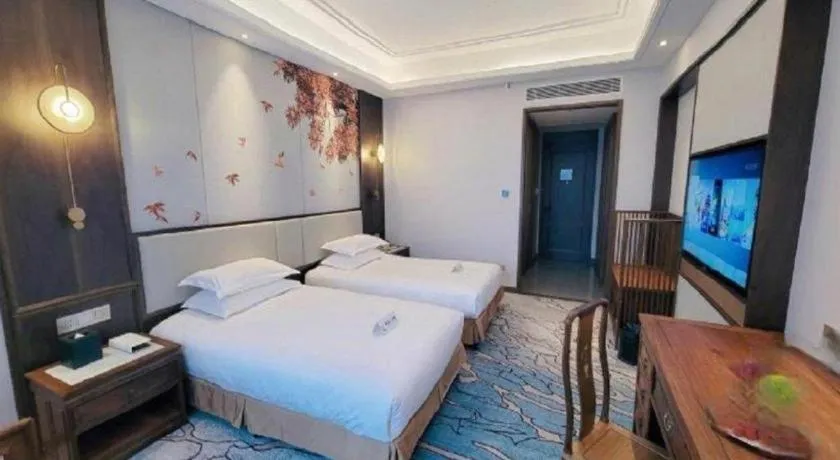 Bed in Hangzhou Blossom Hotel