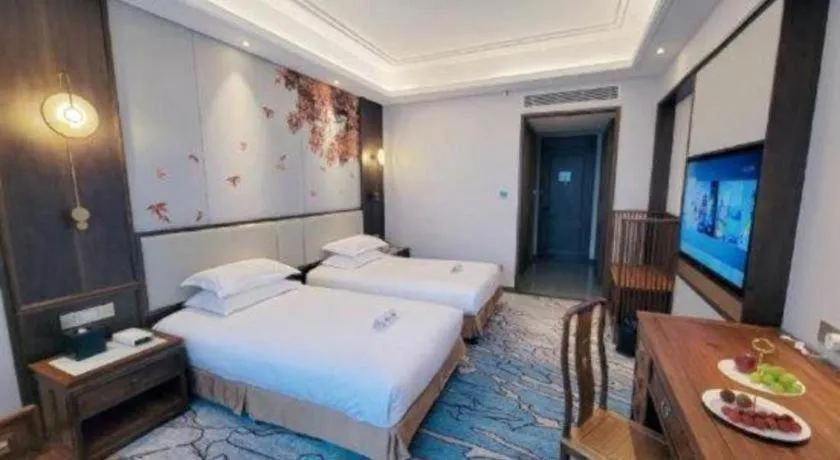 Bed in Hangzhou Blossom Hotel