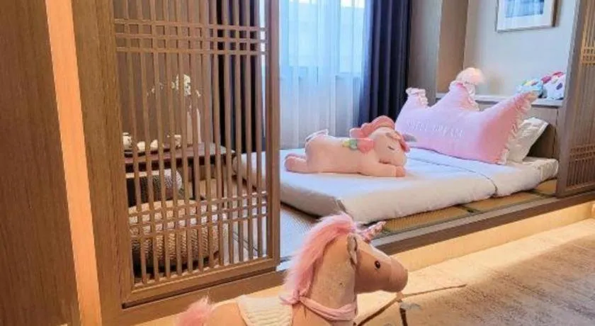 Bed in Hangzhou Blossom Hotel