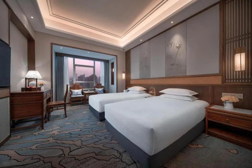 Bed in Hangzhou Blossom Hotel