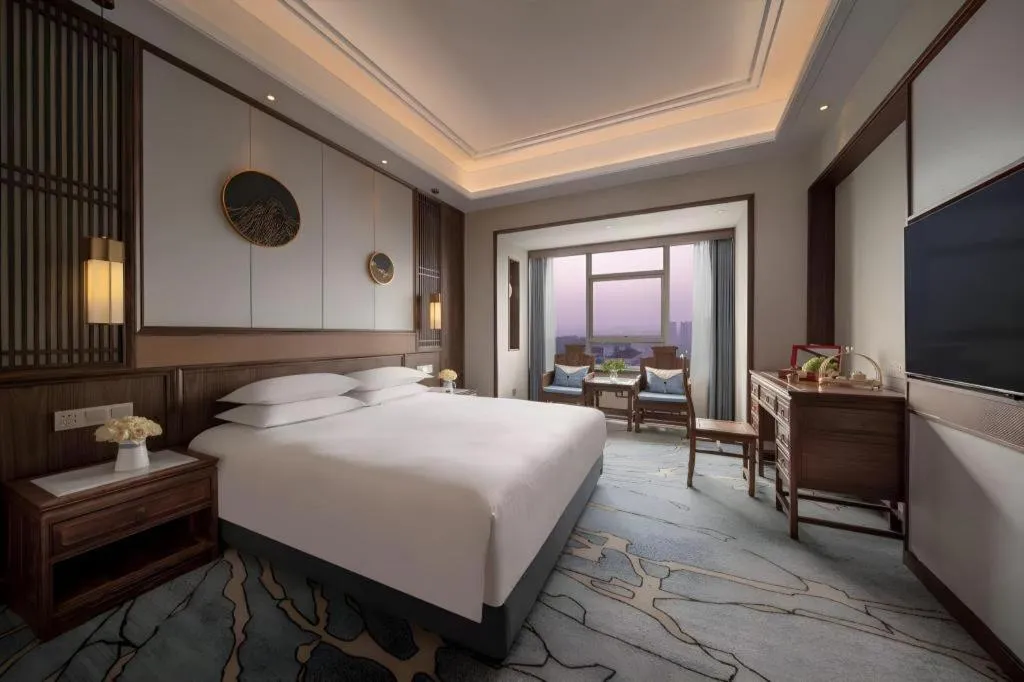 Bed in Hangzhou Blossom Hotel