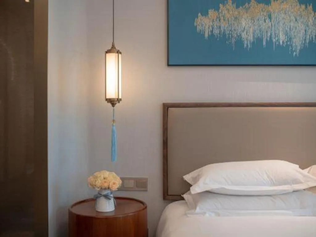 Bed in Hangzhou Blossom Hotel