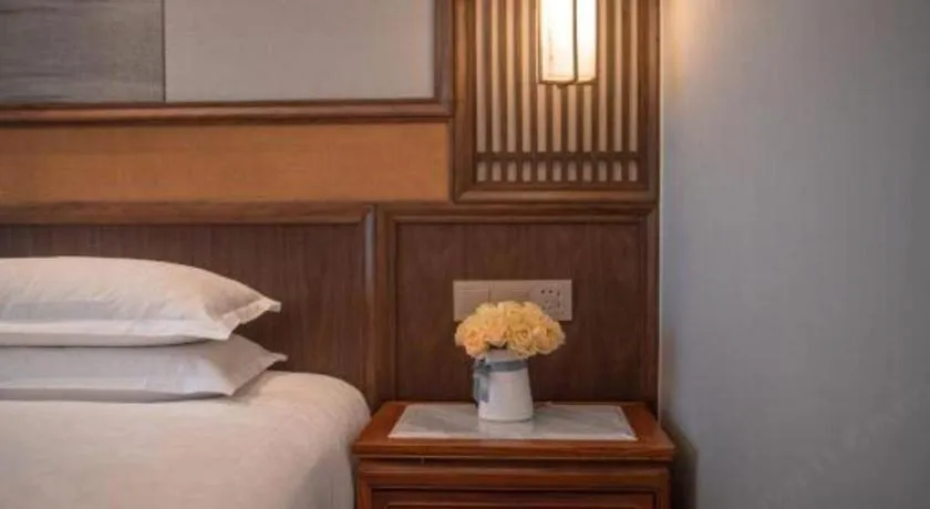 Bed in Hangzhou Blossom Hotel