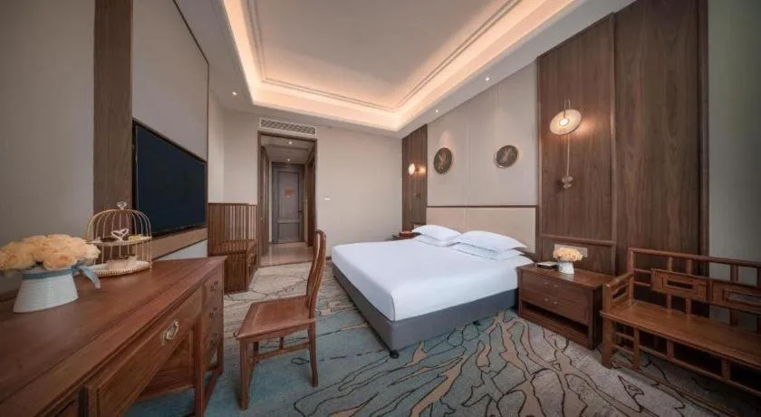 Bed in Hangzhou Blossom Hotel