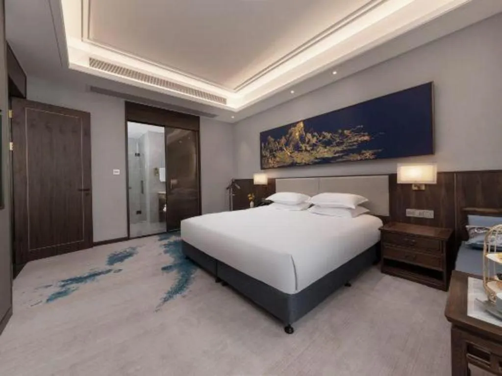 Bed in Hangzhou Blossom Hotel