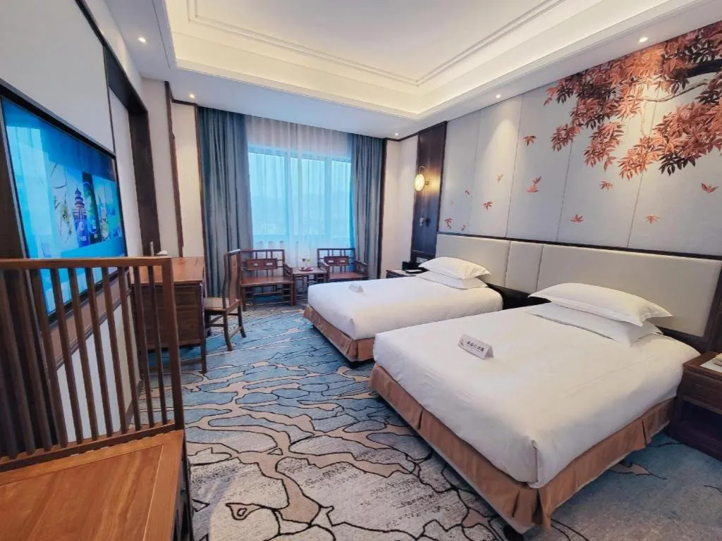 Bed in Hangzhou Blossom Hotel