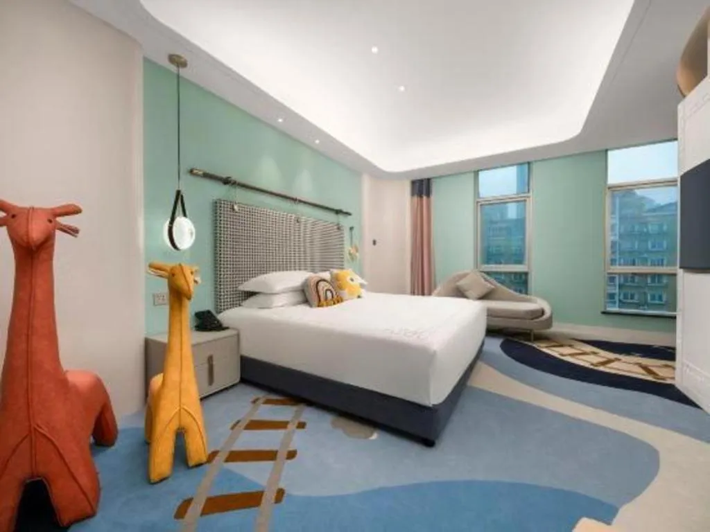 Bed in Hangzhou Blossom Hotel