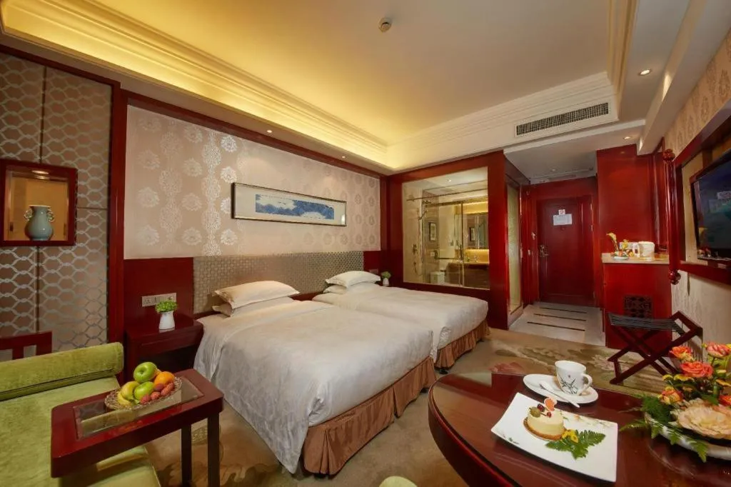 Bed in Hangzhou Blossom Hotel