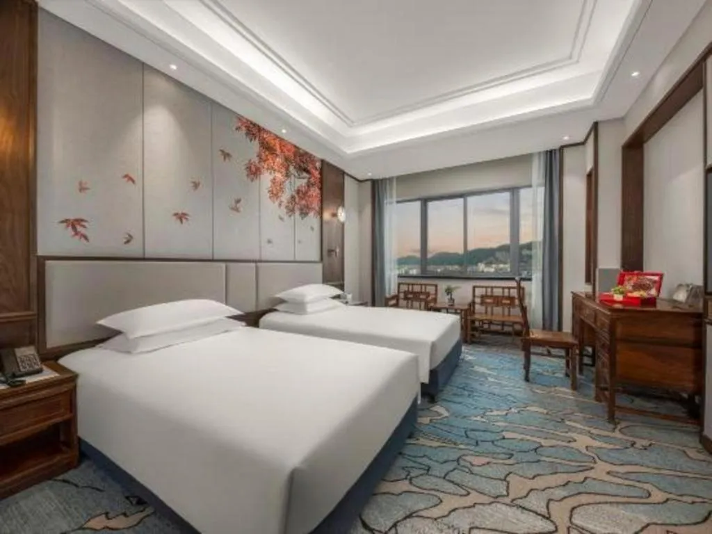 Bed in Hangzhou Blossom Hotel