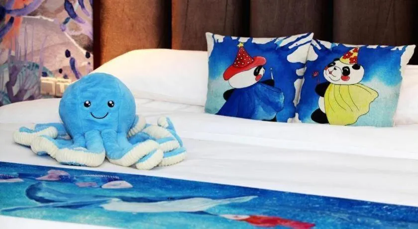 Bed in Xinjin Celebrity City Hotel