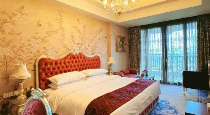 Bed in Xinjin Celebrity City Hotel