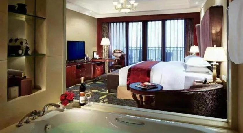 Bed in Xinjin Celebrity City Hotel