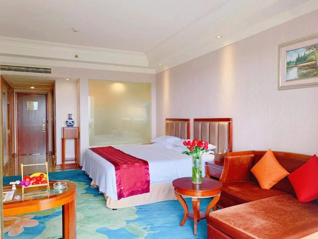 Bed in Xinjin Celebrity City Hotel