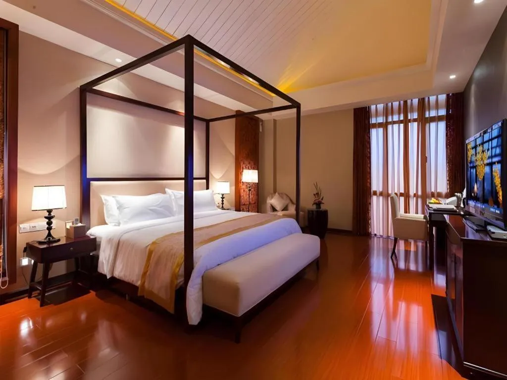 Bed in Xinjin Celebrity City Hotel