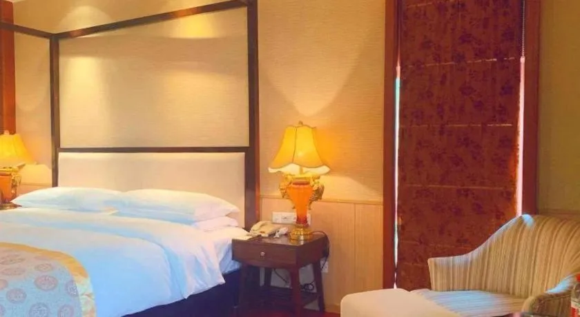 Bed in Xinjin Celebrity City Hotel