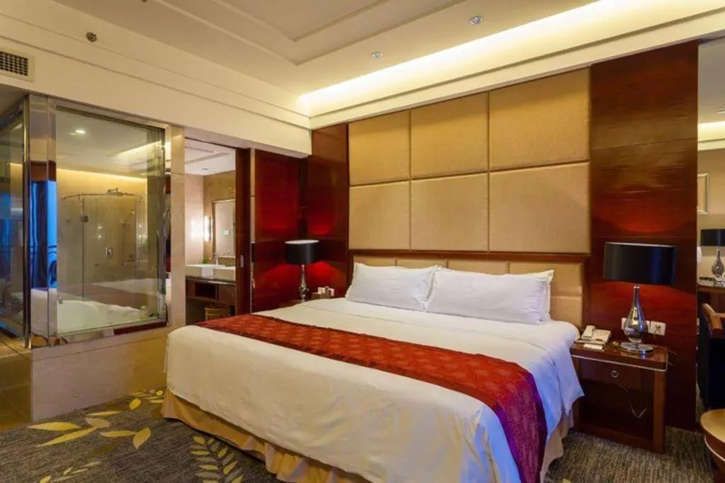 Bed in Xinjin Celebrity City Hotel