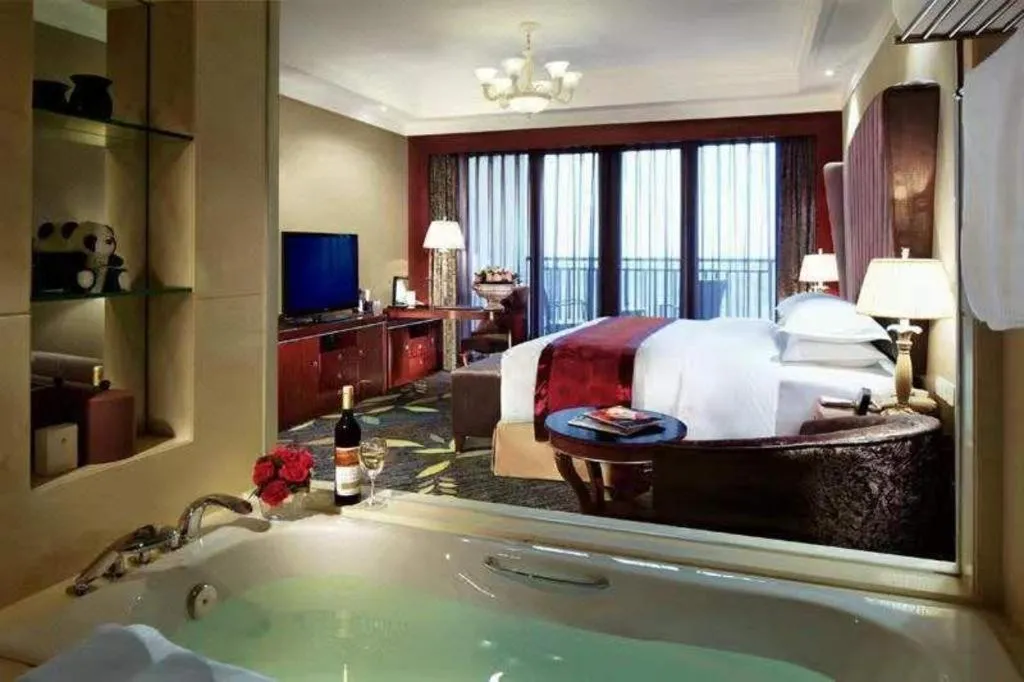 Bed in Xinjin Celebrity City Hotel