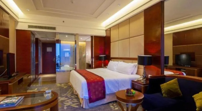 Bed in Xinjin Celebrity City Hotel