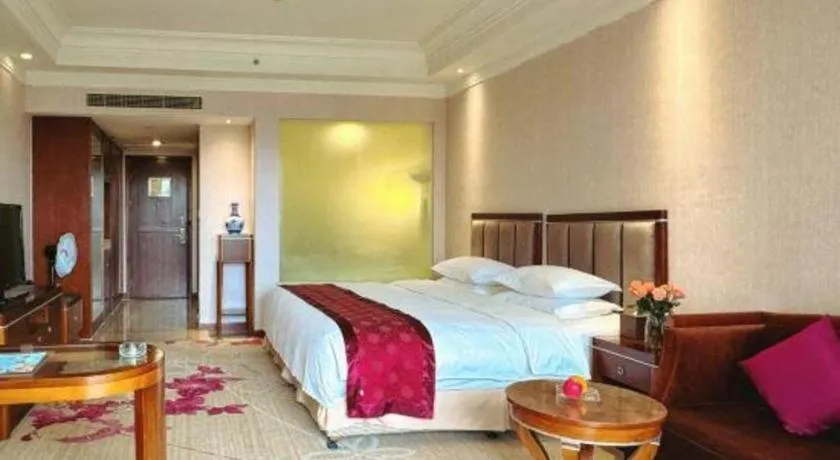 Bed in Xinjin Celebrity City Hotel