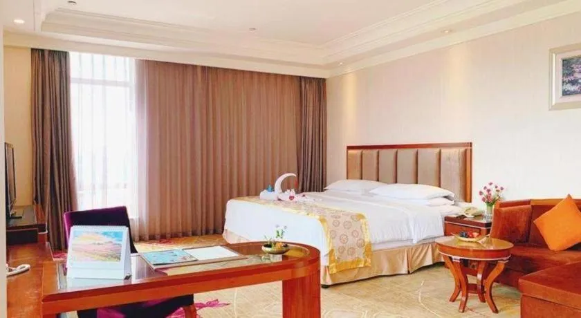 Bed in Xinjin Celebrity City Hotel