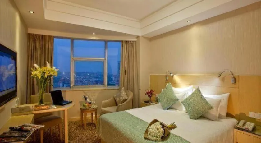 Bed in Huachen Kenzo Hotel Hangzhou