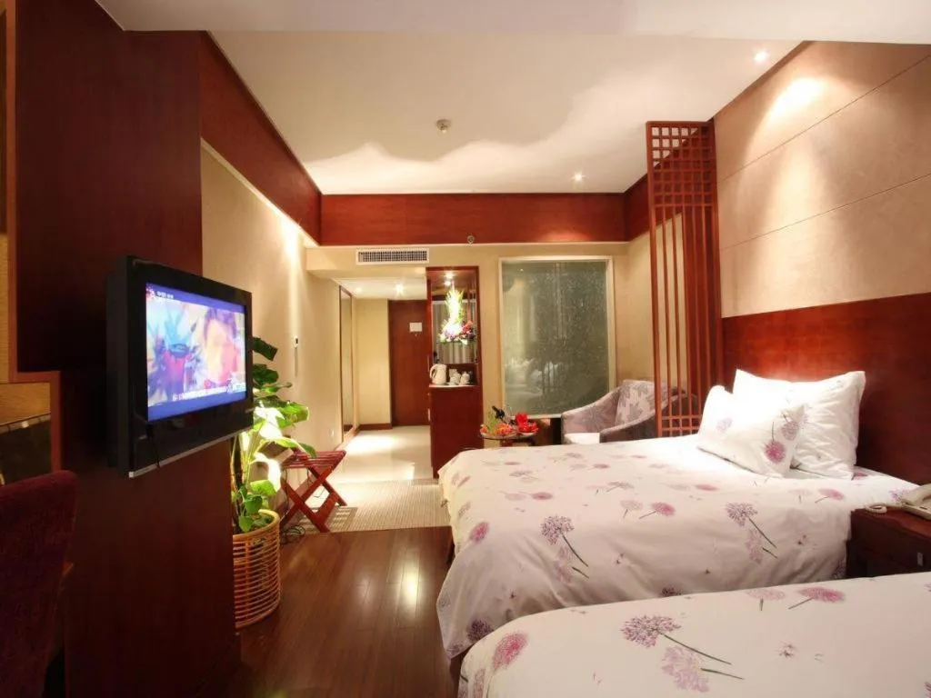 Bed in Huachen Kenzo Hotel Hangzhou