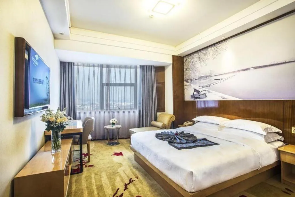 Bed in Huachen Kenzo Hotel Hangzhou