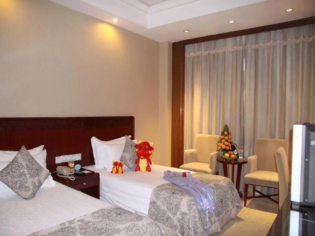 Bed in Huachen Kenzo Hotel Hangzhou