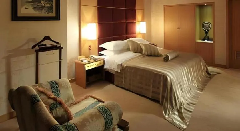 Bed in Economic Trade Hotel