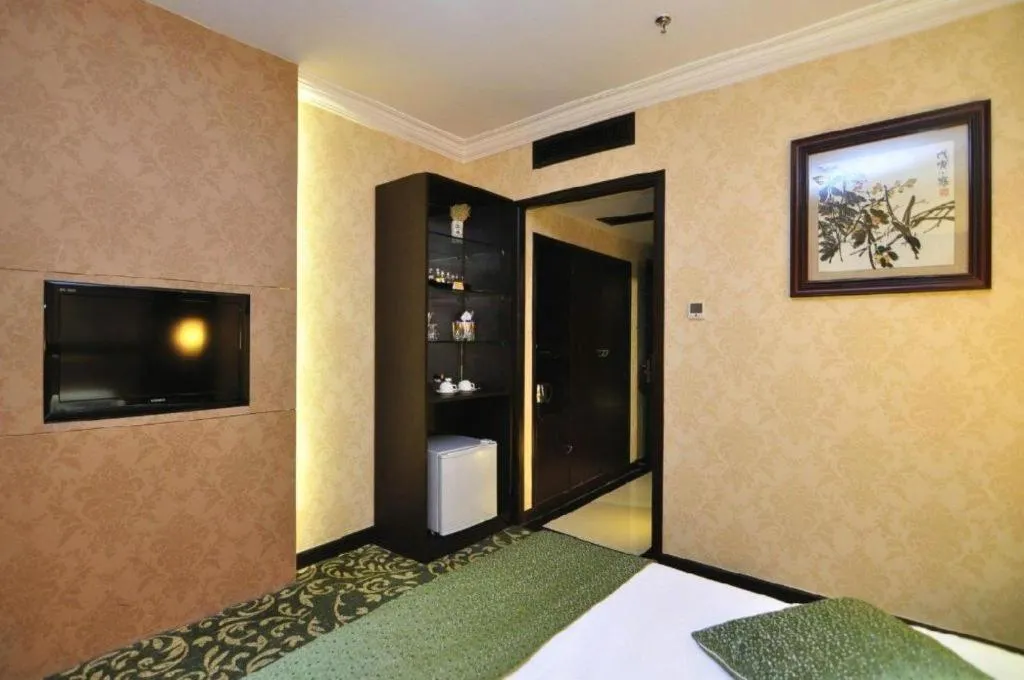 Bed in Economic Trade Hotel