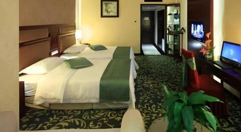 Bed in Economic Trade Hotel