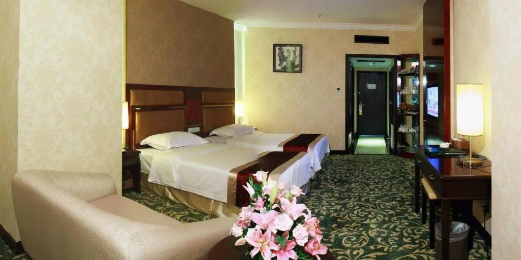 Bed in Economic Trade Hotel