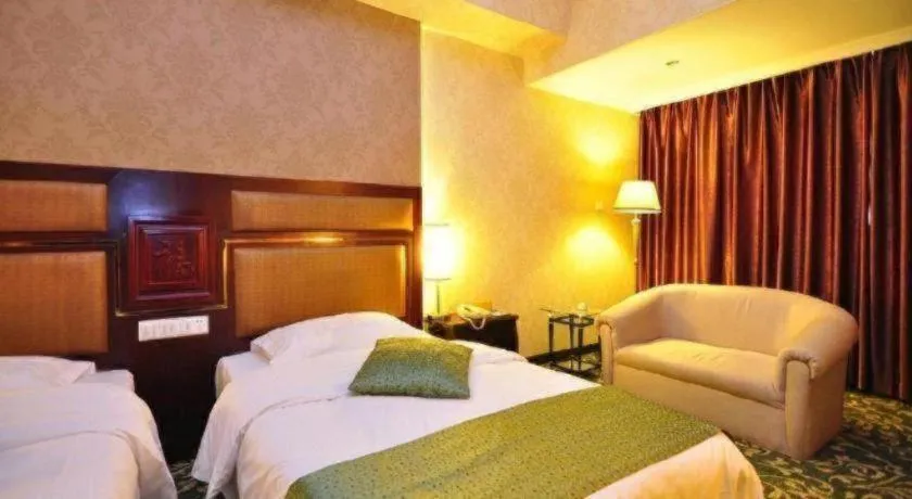 Bed in Economic Trade Hotel