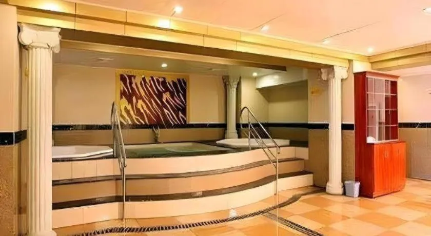 Bed in Economic Trade Hotel