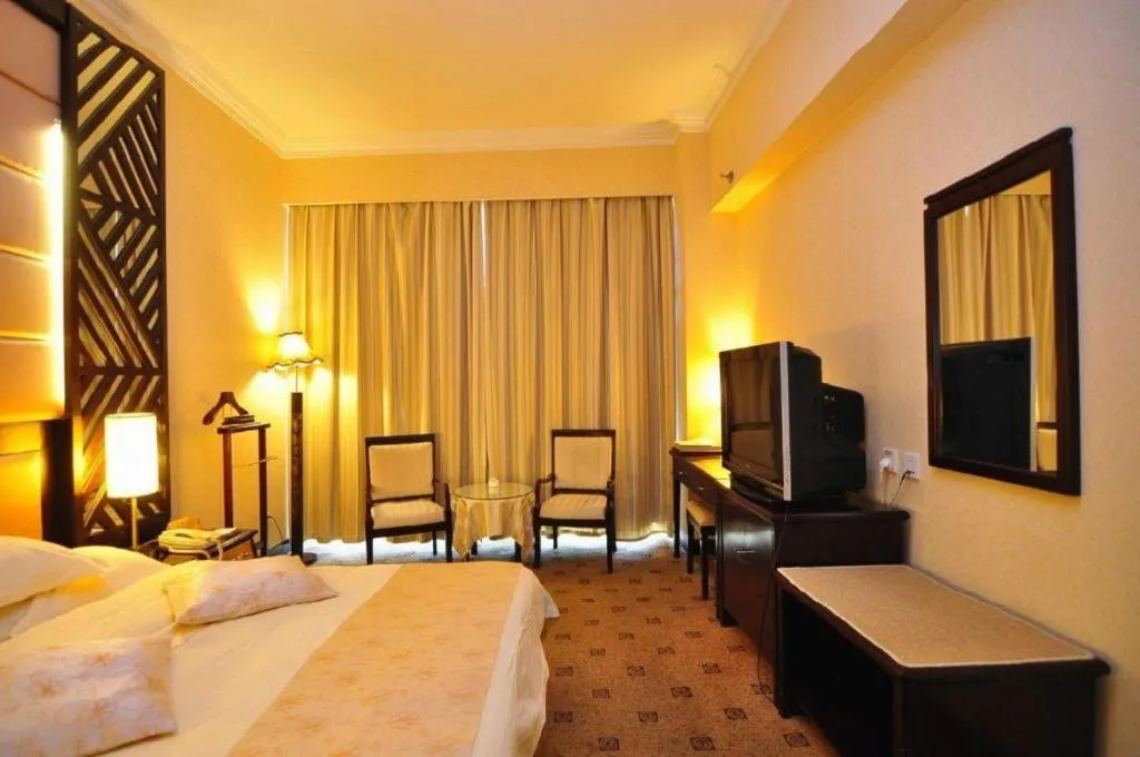 Bed in Economic Trade Hotel