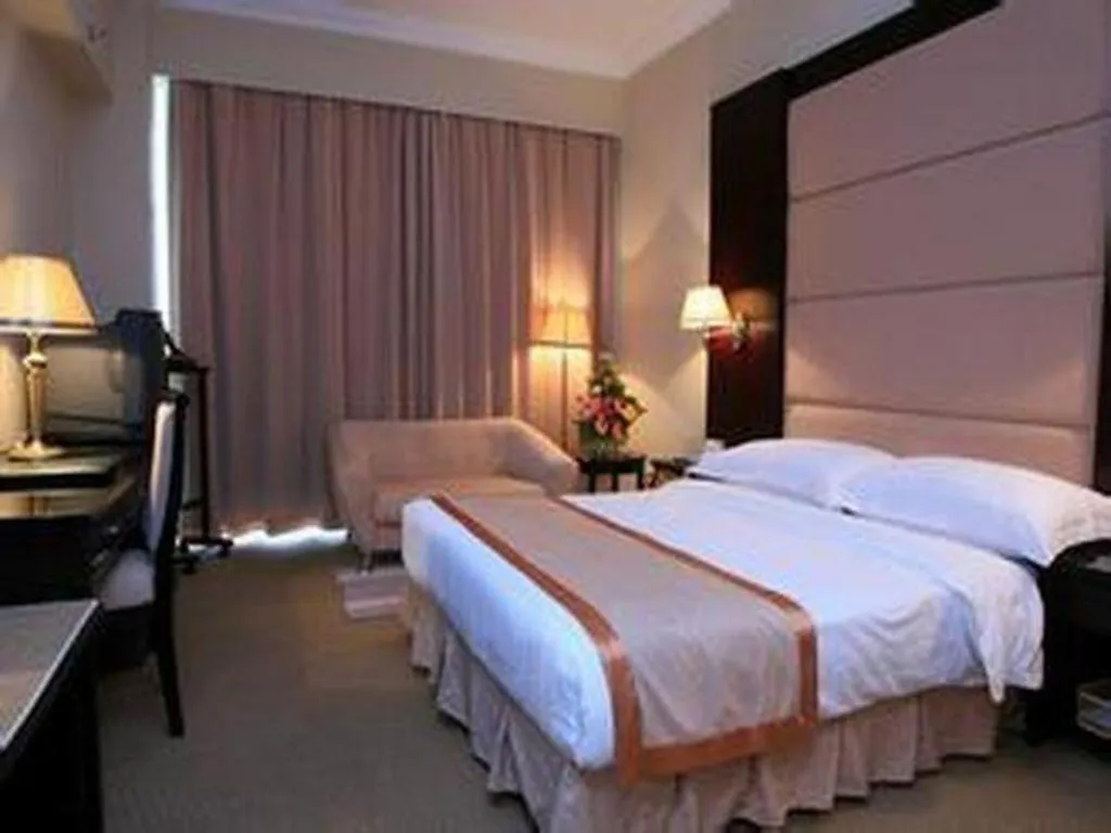 Bed in Economic Trade Hotel