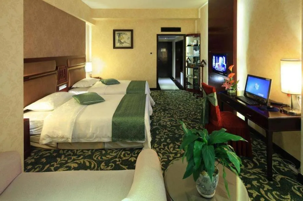 Bed in Economic Trade Hotel