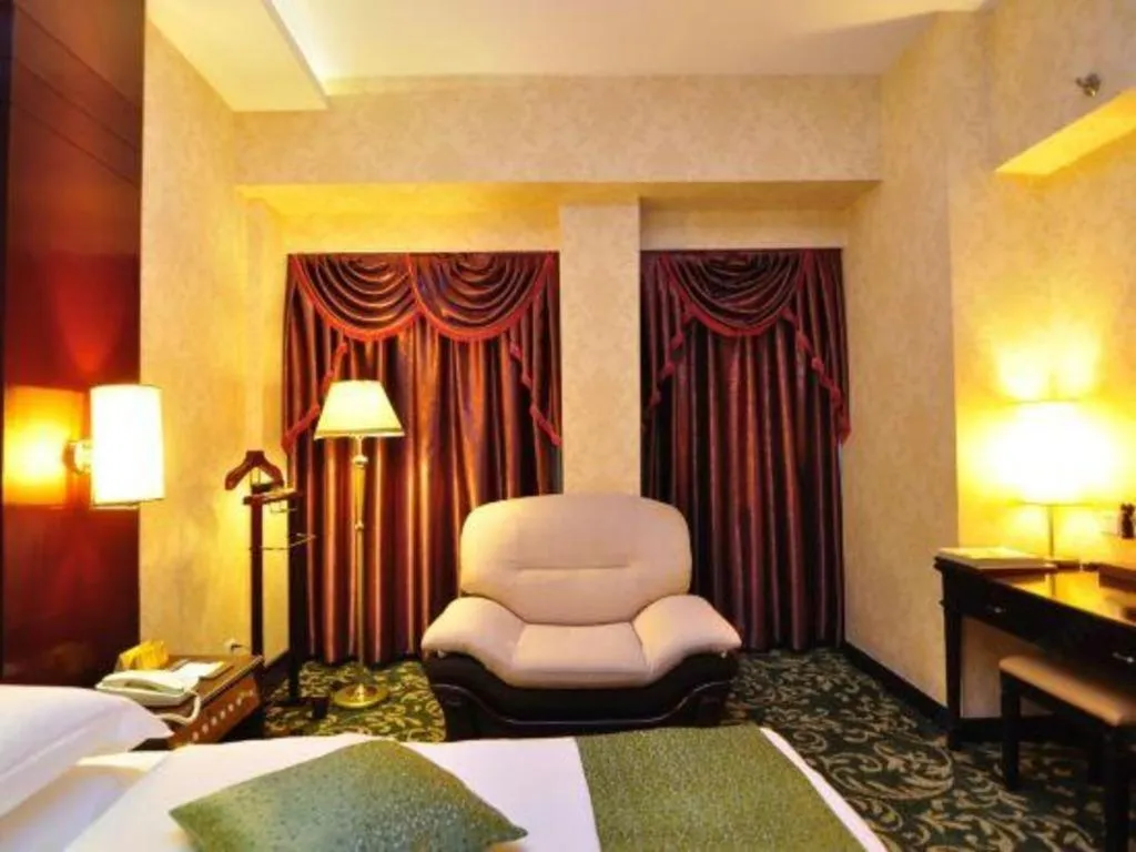 Bed in Economic Trade Hotel