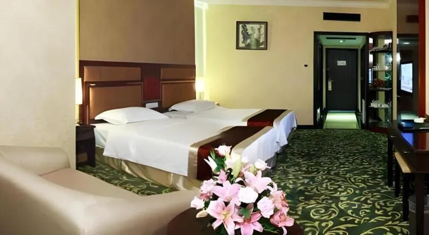 Bed in Economic Trade Hotel