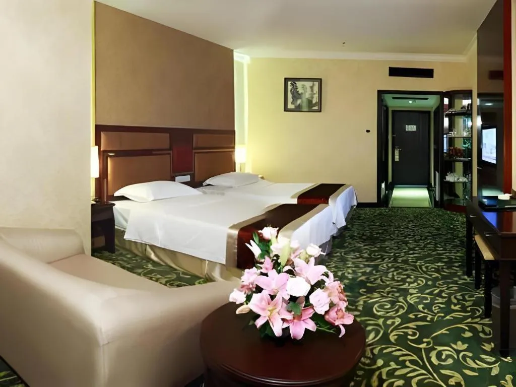 Bed in Economic Trade Hotel