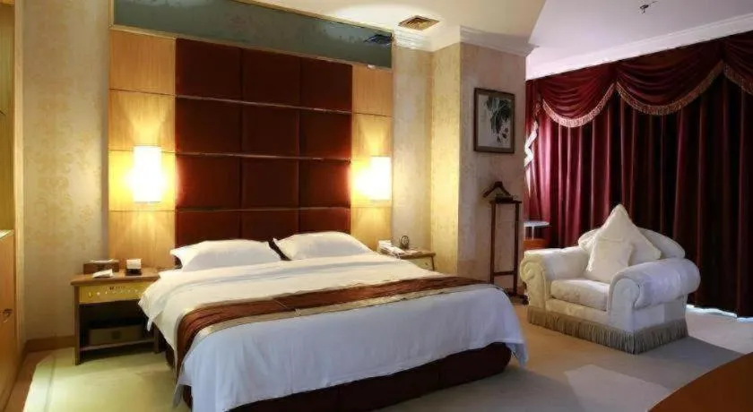 Bed in Economic Trade Hotel