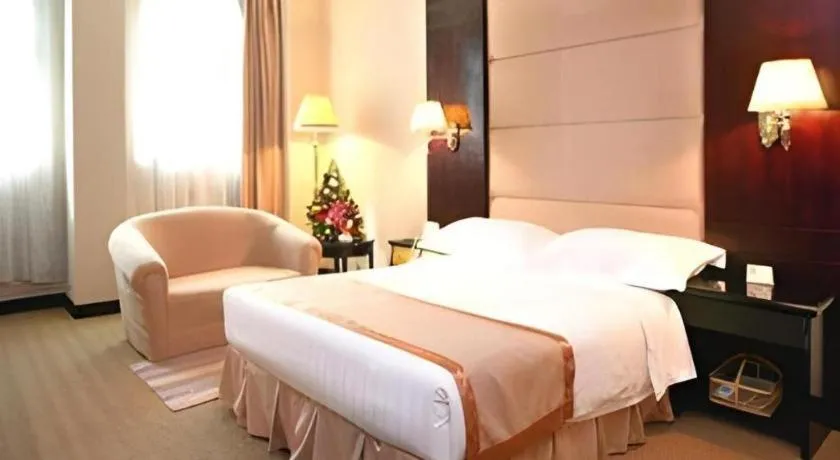 Bed in Economic Trade Hotel