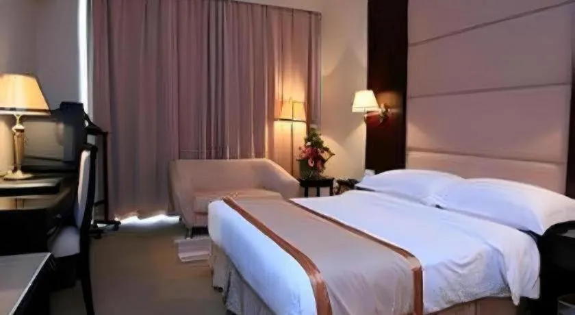 Bed in Economic Trade Hotel